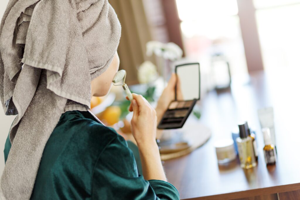 woman-massaging-her-face-with-roller-2025-01-27-05-52-55-utc